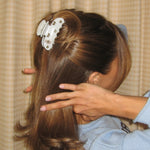 model wearing Sweetheart Clip in Dream Cloud Teddy in hair