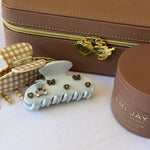 assorted emi jay hair care and accessories