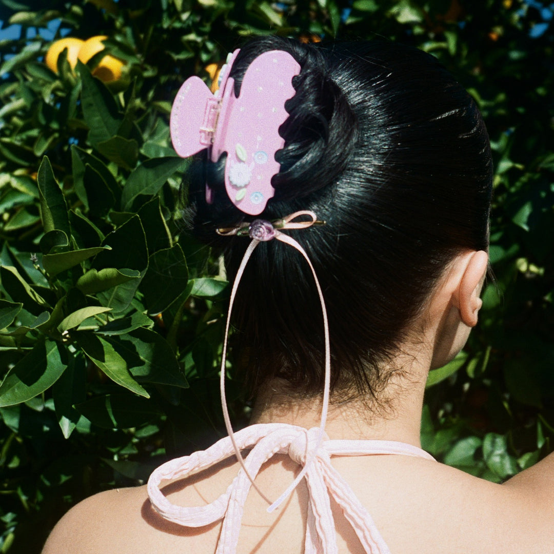 model wearing Sweetheart Clip in Mauve Bloom