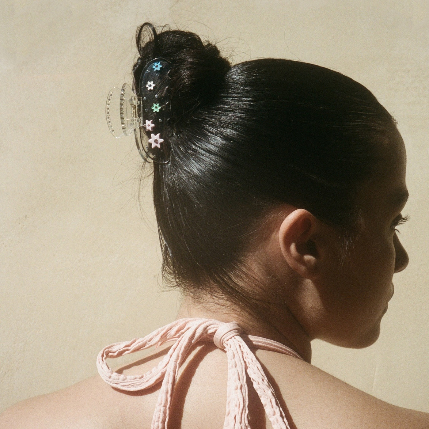 model wearing Sweetheart Clip in Sugar Bloom in hair