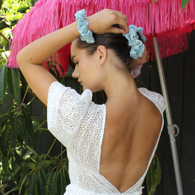 model wearing Printed Scrunchie in Portofino in hair and on wrist