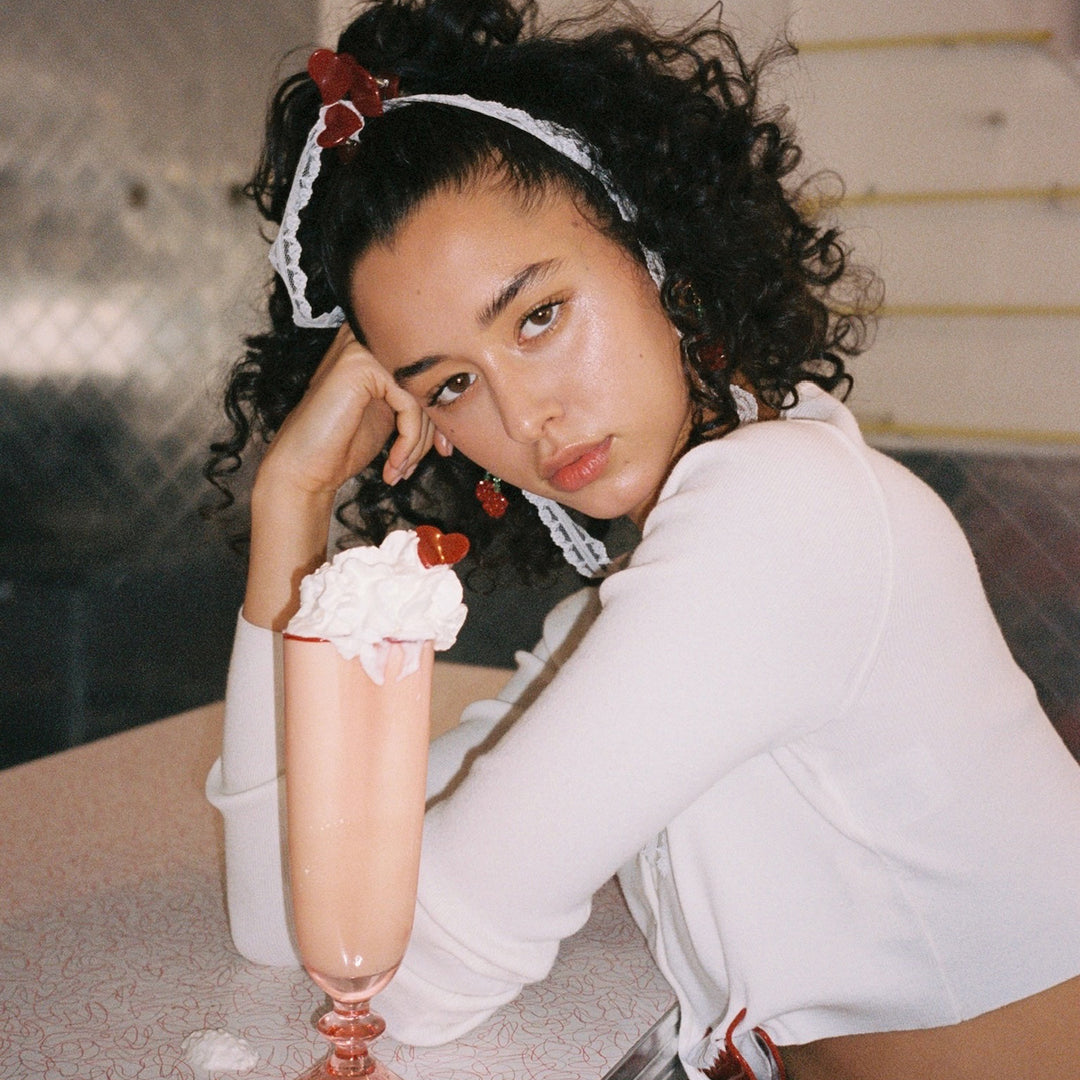 model with Baby Heart Clip Set in Cherry Kiss on milkshake