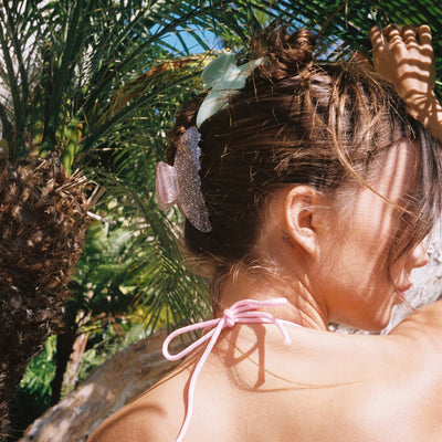 model wearing Big Effing Clip in Pistachio + Beach Fairy in hair