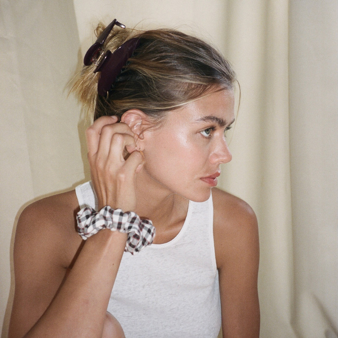 model wearing Big Effing Clip in Bordeaux in hair