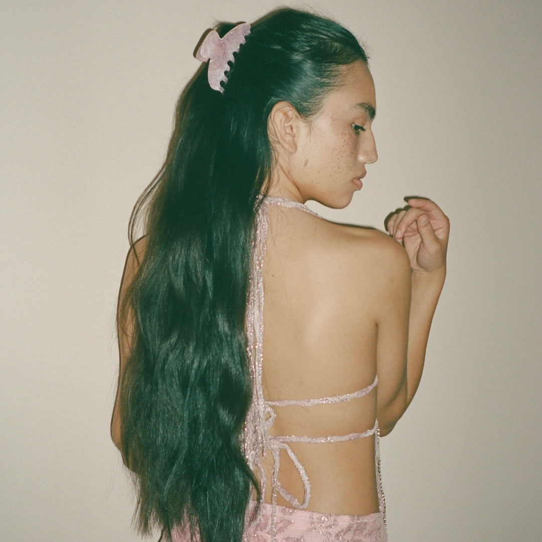 Model with Big Effing Clip in Pink Sugar in her hair