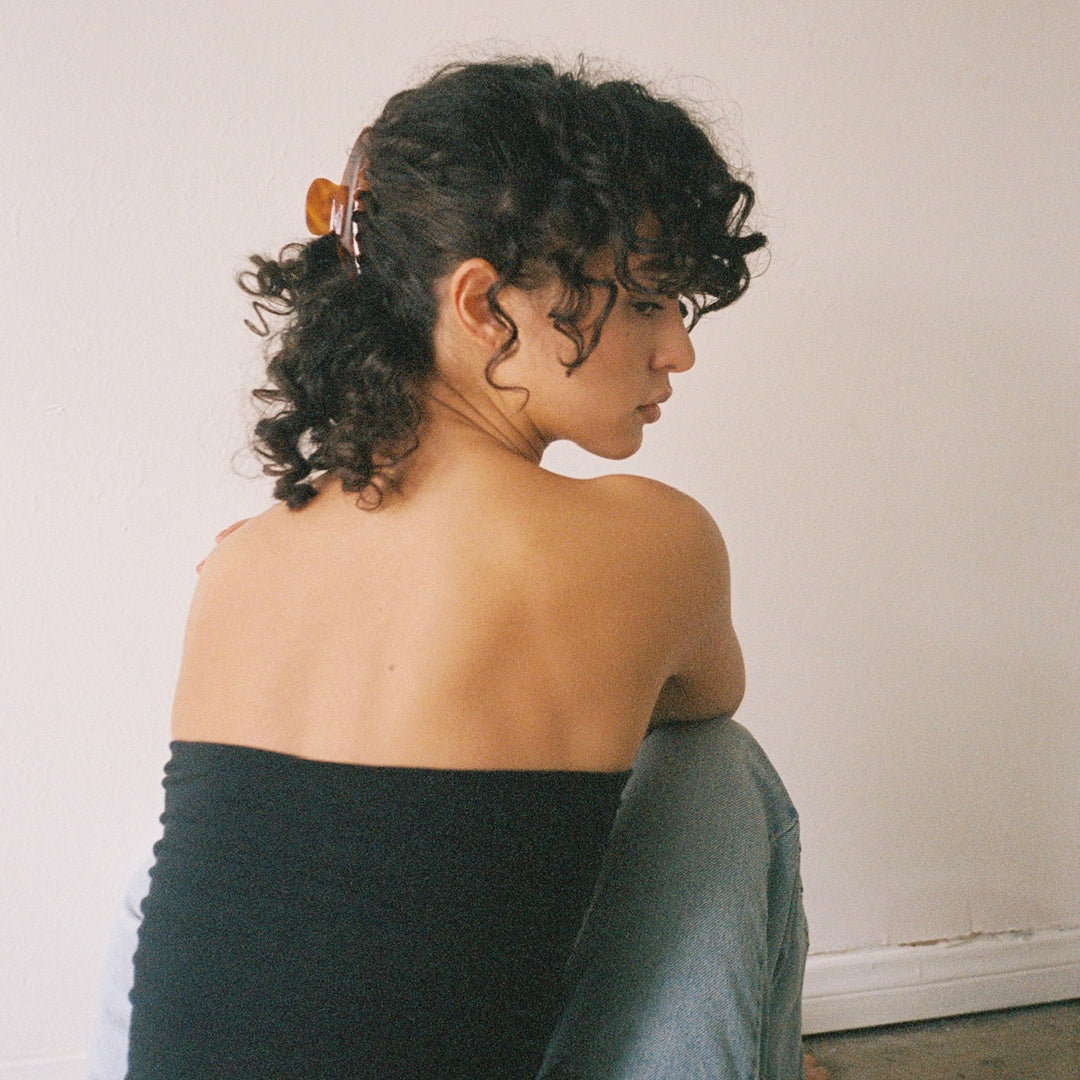 model wearing Big Effing Clip in Tortoise in hair