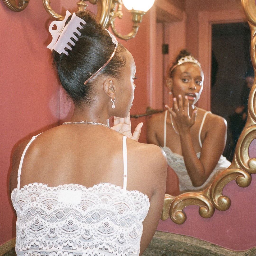 model wearing Heartbreaker Clip in Pink Vanilla in hair