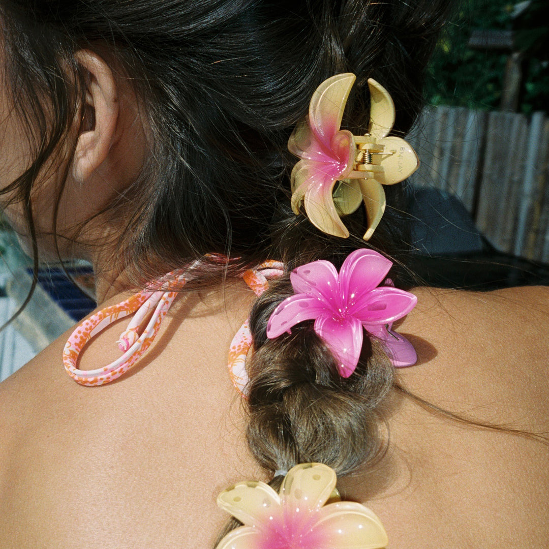 closeup of Midi Super Bloom Clip in Starfruit + Dragonfruit in hair