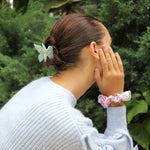model wearing Papillon Clip in La Mer in hair