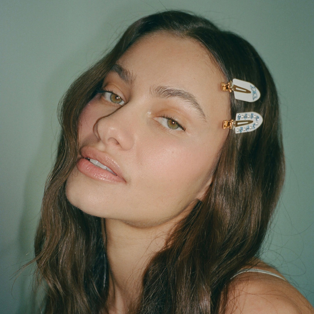 model wearing Popstar Clips in Fairytale + Flutters in hair