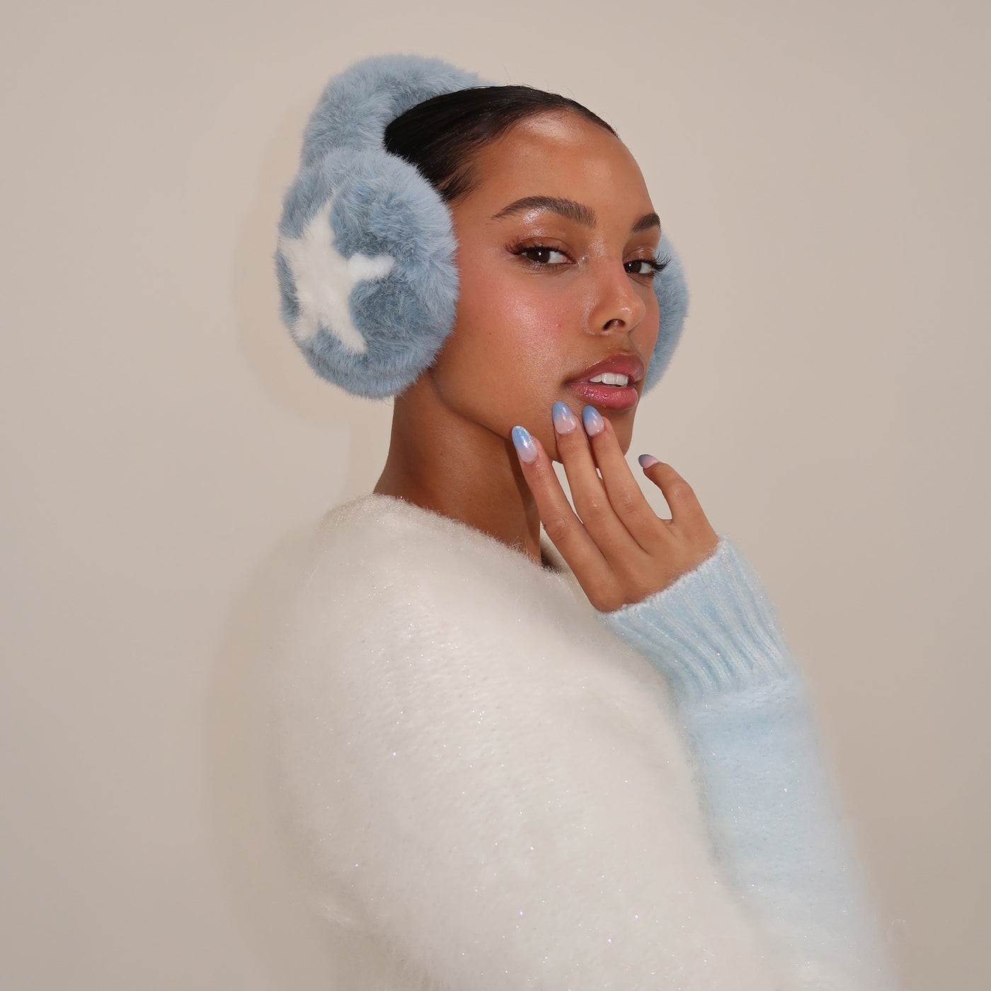 model wearing Sugar Muffs in Winter Dream