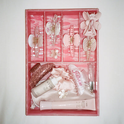top view of Vanity Tray in Pink Smoke with hair clips and accessories